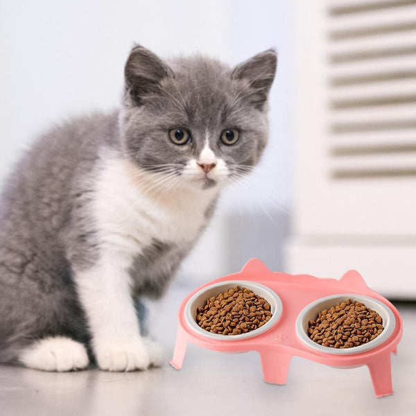 Ceramic cat food and water bowl set with anti-slip base, modern design, and ergonomic shape for cats and small pets.